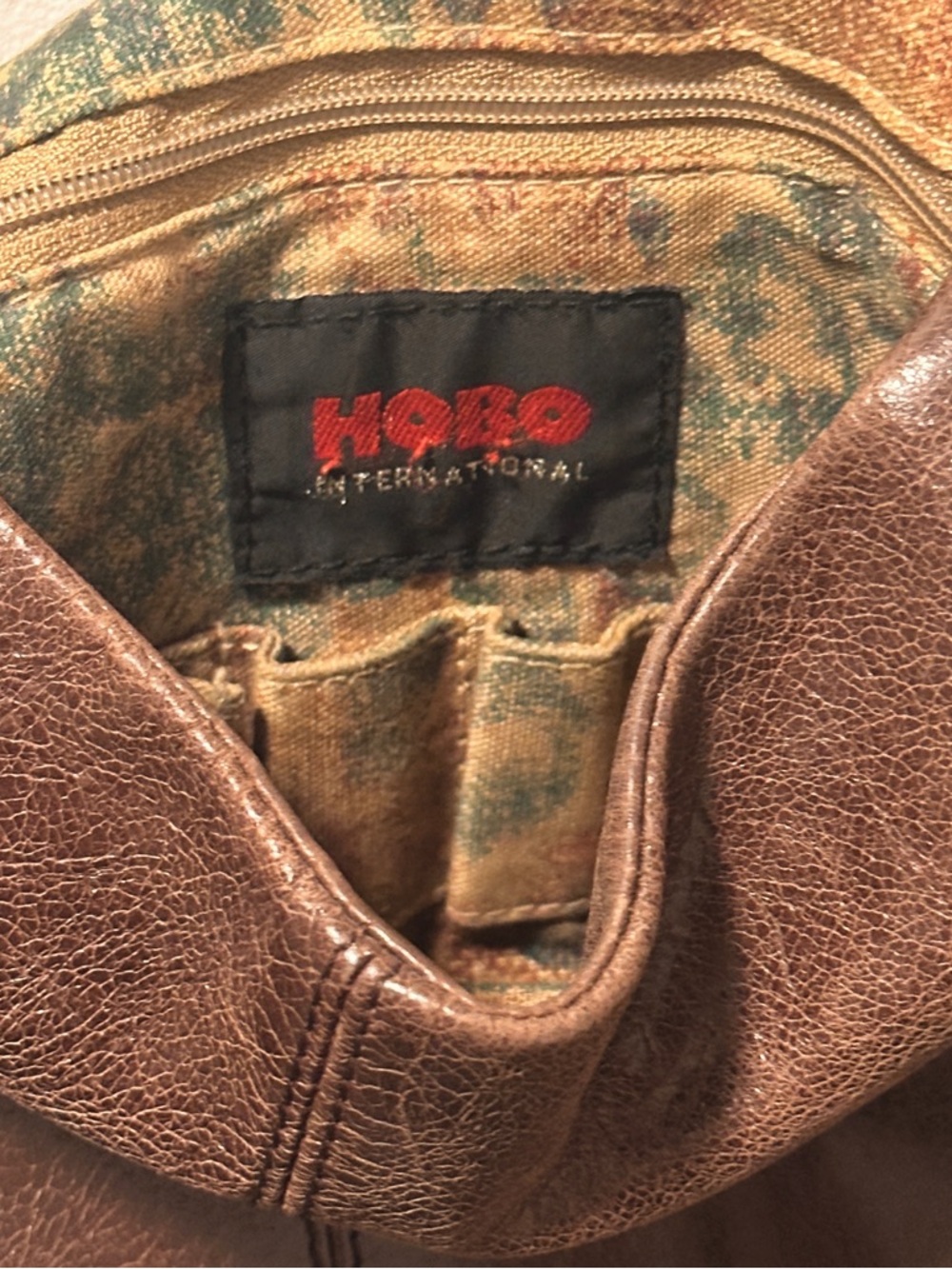 Brown Leather Hobo International Bag with Silver Ring Accents - Picture 3 of 5